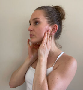 Woman doing lymphatic drainage massage